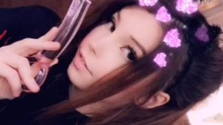 Belle Delphine Licking A Glass Dildo