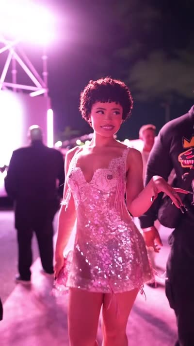 Ice Spice Walks Slow Mo In Shiny Dress