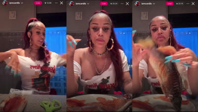 Cardi B Eats Fish With Tits Out
