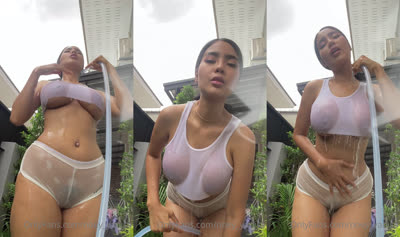 Noey_Yanisa Showers Outside With A Water Hose
